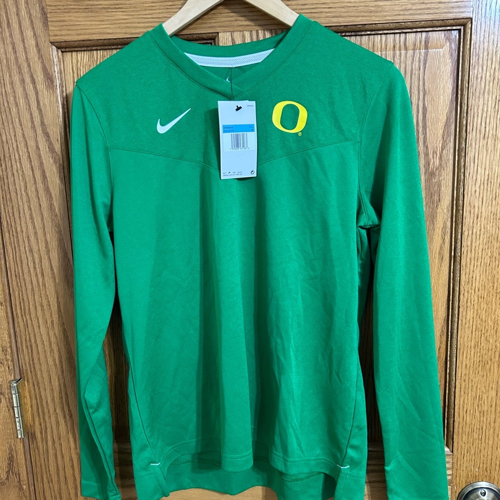 Nike Oregon Ducks Green Long Sleeve Performance Top. Nike sample
